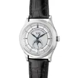 Patek Philippe, A fine and attractive white gold annual calendar wristwatch with center seconds, day and date, 24-hour indication, moon phases, Certificate of Origin and winding box