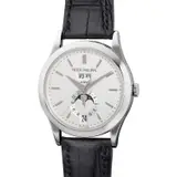 Patek Philippe, A fine and attractive white gold annual calendar wristwatch with center seconds, moon phases, Certificate of Origin and presentation box