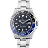 Rolex, A fine and rare stainless steel dual time wristwatch with center seconds, date, bracelet, guarantee and presentation box