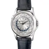 Patek Philippe, A fine and attractive white gold world time wristwatch with guilloché dial, Certificate of Origin and presentation box