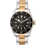 Tudor, A fine two tone stainless steel and yellow gold diver’s wristwatch with center seconds, date, bracelet, guarantee and presentation box, Circa 2017