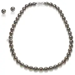 Mikimoto, A Set of Black Cultured Pearl Necklace and Earrings, Necklace: - Forty five black cultured pearls, measuring approximately 7.96 mm to 10.32 mm - 18K white gold - With maker's mark, M for Mikimoto - Length 43.1 cm Earrings: - Two black cultured pearls, measuring approximately 9.79 mm to 9.82 mm - 18K white gold - With maker's mark, M for Mikimoto Accompanied by a Mikimoto blue leather box