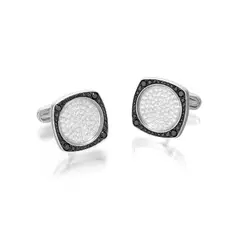 William & Son, A Pair of Diamond, Coloured Diamond and Colourless Sapphire Cufflinks, - Two carved colourless sapphires - One hundred and eighteen brilliant-cut diamonds - Seventy two circular-cut black diamonds - 18K white gold and oxidized white gold - Maker's mark and with British hallmark - Length 2.2 cm, width 1.9 cm