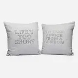 Banksy, Gross Domestic Product Cushions (set of two), 2019, spray paint on fabric