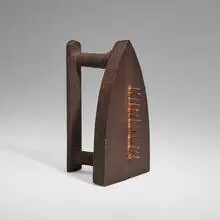 Cadeau by Man Ray, cast iron, steel tacks, sold Apr 2024