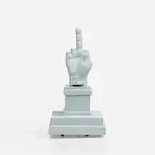 L.O.V.E. music box by Maurizio Cattelan, 2014, resin, metal, sold Apr 2024