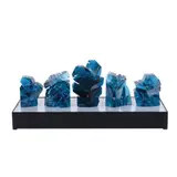Ramon Orlina, a.) Tranquil b.) Compelling c.) Magnificence in Blue II - 2011 d.) Indomitable e.) Radiant, c.) Magnificence in Blue II - 2011 signed and dated 2011 carved azure blue crystal H: 11 1/2" (29 cm) W: 7 1/2" (20 cm) L: 5" (13 cm)<br /><br /> d.) Indomitable signed and dated 2018 carved mediterranean crystal H: 8" (21 cm) W: 6" (16 cm) L: 4 1/2" (12 cm)<br /><br />