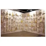 José John Santos III, Hide and Seek, 83 resin-coated fabric bags