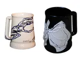 a.) Solomon Saprid b.) José Joya a.) b.), a.) Mug 1 b.) Mug, ceramic