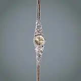 Omega Diamond Cocktail Watch, Untitled, Year: c. 1950s–1960s <br> Movement: manual reassembly <br> Functions: hours and minutes <br> Case: the case and ornate integrated bracelet are crafted from white gold <br> Case diameter: 16 mm <br> Bezel: diamond-set bezel and lugs, snap-on case back <br> Dial: champagne dial with applied baton hour markers <br> Strap/bracelet: fitted precious-metal bracelet <br> Weight: 19.1 grams <br> No original box, no original papers
