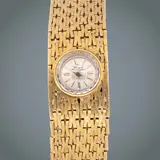 Untitled by Girard-Perregaux Lady’s Gold Cocktail Watch, Movement: manual-winding <br> Case: small, circular case in yellow gold <br> Dial: champagne dial: accented by gold bato, sold Jul 2026