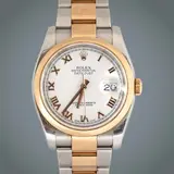 Rolex Datejust, Untitled, Reference: 16203 <br> Year: c. 1988–2004 <br> Movement: Automatic, cal. 3135 <br> Functions: hours, minutes, central sweep seconds, instantaneous date <br> Power reserve: 48-hour power reserve <br> Case: durable oyster case with a scratchresistant sapphire crystal and a screw-down crown for waterproof protection up to 330 feet <br> Case diameter: 36 mm <br> Thickness: 13.51 mm <br> Bezel: yellow gold bezel <br> Dial: white dial set with gold Roman hour markers, central sweep hands, and a date aperture at the 3-hour marker with Cyclops magnifying lens <br> Strap/bracelet: flat link oyster bracelet with high polish yellow gold center links and a fliplock clasp <br> Weight: 135 grams <br> No original box, no original papers