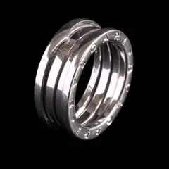 Untitled by An 18k Thick Band Ring, An 18k white gold band, designed in the distinctive style of the Bvlgari B.Zero1 collection. <br> Hallmarked 57, Made in, sold Jul 2026