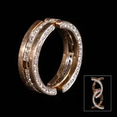Untitled by A ‘Motion Ring’ Style Ring in 14k, The ring in 14k rose gold is designed to transform its shape and features diamonds weighing approximately 1.08 cts set i, sold Jul 2026