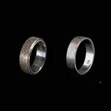 Untitled by A Pair of Rings, a.) A 14k Wedding Band <br> The wedding band in 14k white gold features a stepped-edge and wire brushed texture. <br> Th, sold Jul 2026