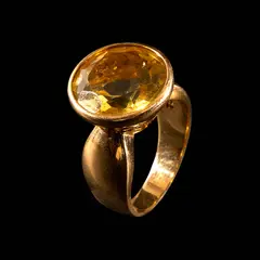 Untitled by A Cocktail Ring in 18k, The ring features a round green stone set in 18k yellow gold. <br> Weighs 9.80 grams., sold Jul 2026