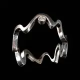 Untitled by A Tiffany & Co. Frank Gehry Equus Ring in 18k, The Tiffany & Co. Frank Gehry Equus ring in 18k white gold features a bold, fluid, freeform wave design unconstrained by, sold Jul 2026