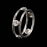 A Tiffany & Co. Elsa Peretti® Diamonds by The Yard® Ring in Platinum, Untitled, The Tiffany & Co. Elsa Peretti® Diamonds by the Yard® ring in platinum features bezel-set round diamonds weighing approximately 0.35 cts on a minimalist open band. <br> Signed Tiffany & Co. Peretti <br> Hallmarked 750 <br> Weighs 3.60 grams. <br> Diamonds noted as Pass on the GIA iD100®