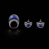 Untitled by A Set of Lapis Lazuli Jewelry in 14k, The set comprises a coordinating ring and earring set in 14k white gold. At the center of the design are crescent moon-s, sold Jul 2026