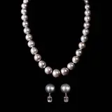 Untitled by A Set of Gray Pearl Necklace and Earrings, The two-piece set features a strand of 12mm gray pearls, secured by a silver clasp accented with round crystals. <br> Ac, sold Jul 2026