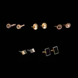 A Collection of Cufflinks, Untitled, a.) Rope Cufflinks in 10k <br> A pair of rope design cufflinks in 10k rose gold. The piece is hallmarked 375 with British assay marks. <br> Weighs 14.80 grams. <br> <br> b.) Disc Cufflinks in 12k <br> The pair of cufflinks designed as discs with pearls set in 12k rose gold. <br> Weighs 8.30 grams. <br> <br> c.) Black & White Pearl Cufflinks in 14k <br> The pair of cufflinks designed as oval-shaped discs with black and white pearls set in 14k yellow gold. <br> Hallmarked 14k. <br> Weighs 6.80 grams. <br> <br>
