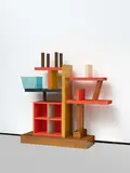 Bücherregal "Liana" by Ettore Sottsass, 1985/1992, Verschiedene Holzsorten (z.B. Wengé, Kirsche, Eiche), teilweise lackiert, blaues Acrylglas, sold Dec 2021
