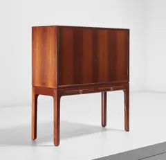 Small cabinet by Ole Wanscher, 1954, Brazilian rosewood-veneered wood, Brazilian rosewood, mahogany, brass, sold Dec 2020