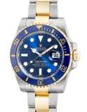 Rolex, A fine and well-preserved two tone yellow gold and stainless steel diver’s wristwatch with date, center seconds, bracelet, guarantee and box
