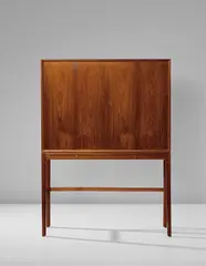 Cabinet by Ole Wanscher, 1954, Brazilian rosewood-veneered wood, Brazilian rosewood, brass, sold May 2018
