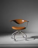 Hans J. Wegner, Early swivel armchair, model no. JH502, designed 1955, produced 1960s, teak, chromium-plated metal, leather, acrylic