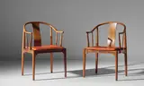 Pair of 'China' chairs, model no. 4283 by Hans J. Wegner, designed 1944, produced 1968, Brazilian rosewood, Niger leather, sold Nov 2018