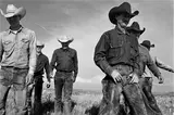 Laura Wilson, Cowboys Walking, J.R. Green Cattle Company Shackelford County, Texas, May 13, 1997, Gelatin silver print