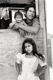 Laura Wilson, Child with Father and Sister, Colonia, Nuevo Laredo, Mexico, April 19, 1993, Gelatin silver print