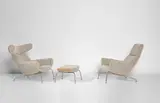 Two 'Ox' lounge armchairs, model nos. AP-46 and AP-47, and footstool, model no. AP-49 by Hans J. Wegner, designed 1960, produced 1960s, chromium-plated steel, chromium-plated tubular steel, fabric, leather, sold Nov 2017