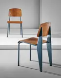 Pair of "Semi-metal" chairs, model no. 305 by Jean Prouvé, circa 1950, painted steel, painted tubular steel, oak-veneered plywood, offered Nov 2016