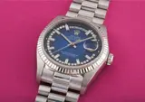 Rolex, A rare and attractive white gold and diamond-set calendar wristwatch with centre seconds, bracelet and blue dégradé dial