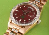 Rolex, A very rare and important pink gold and diamond-set calendar wristwatch with bracelet, centre seconds, burgundy lacquered “Stella” dial, made for the Sultanate of Oman