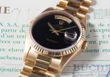 Rolex, A rare yellow gold calendar wristwatch with centre seconds, bracelet, onyx hard stone dial and original guarantee