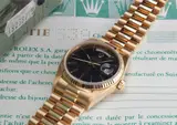 Rolex, A very rare yellow gold calendar wristwatch with bracelet, centre seconds, black lacquered dial, guarantee and box, made for the Sultanate of Oman