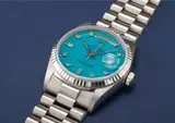Rolex, A very rare and unusual white gold and diamond-set calendar wristwatch with bracelet, centre seconds and turquoise lacquered “Stella” dial
