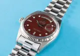 Rolex, An extremely rare, important and possibly unique white gold and diamond-set calendar wristwatch with bracelet, centre seconds, chocolate colour lacquered “Stella” dial and very unusual left handed crown