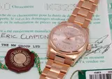Rolex, A rare and attractive pink gold and diamond-set calendar wristwatch with centre seconds, bracelet, pink dial and original guarantee, formerly in the collection of Sir Eric Clapton