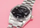 Rolex, A very rare and attractive white gold and diamond-set calendar wristwatch with centre seconds, bracelet and black lacquer dial