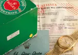 Rolex, A very rare and highly unusual yellow gold calendar wristwatch with linen-textured case and bracelet, centre seconds, champagne dial, Bulletin de Marche and Day-Date booklet
