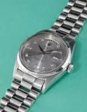 Rolex, An extremely rare and historically important platinum and diamond-set calendar wristwatch with centre seconds, grey dial and big logo bracelet, 1958