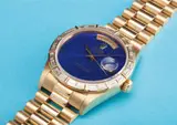 Rolex, A very rare and attractive yellow gold and baguette diamond calendar wristwatch with bracelet, centre seconds and lapis lazuli hard stone dial