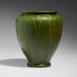 Vase with leaves and buds by Annie Lingley for Grueby Faience Company, 1904-10, glazed earthenware, sold Sep 2025