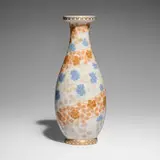 Tall vase with swirling floral design by Manufacture nationale de Sèvres, 1906-08, glazed and gilt porcelain, sold Sep 2025