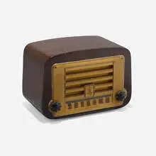 Radio, model 578A by Charles and Ray Eames, 1946, mahogany, plastic, Bakelite, sold Feb 2024