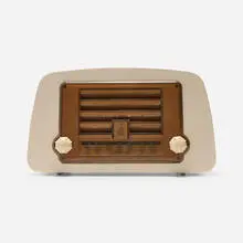 Radio, model 588A by Charles and Ray Eames, 1946, mahogany plywood, plastic, Bakelite, sold Feb 2024